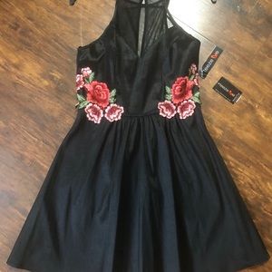 Black sleeveless dress with rose detail sz9/10